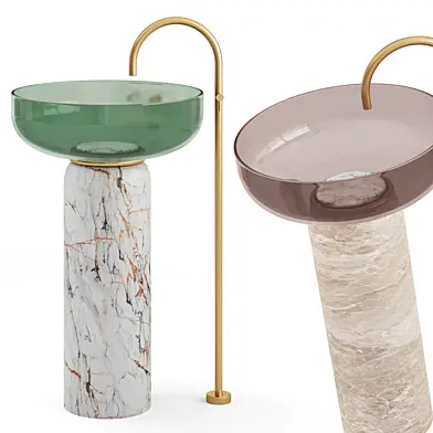 Glass washbasin on a stone pedestal