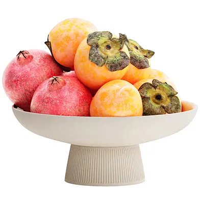 bowl of pomegranate and persimmon fruit