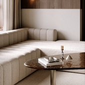 Modern living room with a combination of wood, metal and glass.