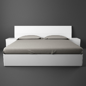 Bed with side table