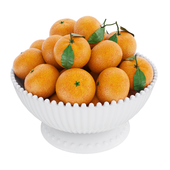 Tangerines in white bowl