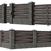 Wooden fence with stone pillars